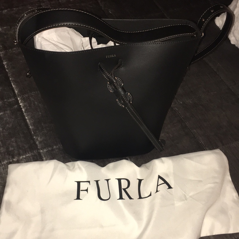 Never used, black leather bucket bag